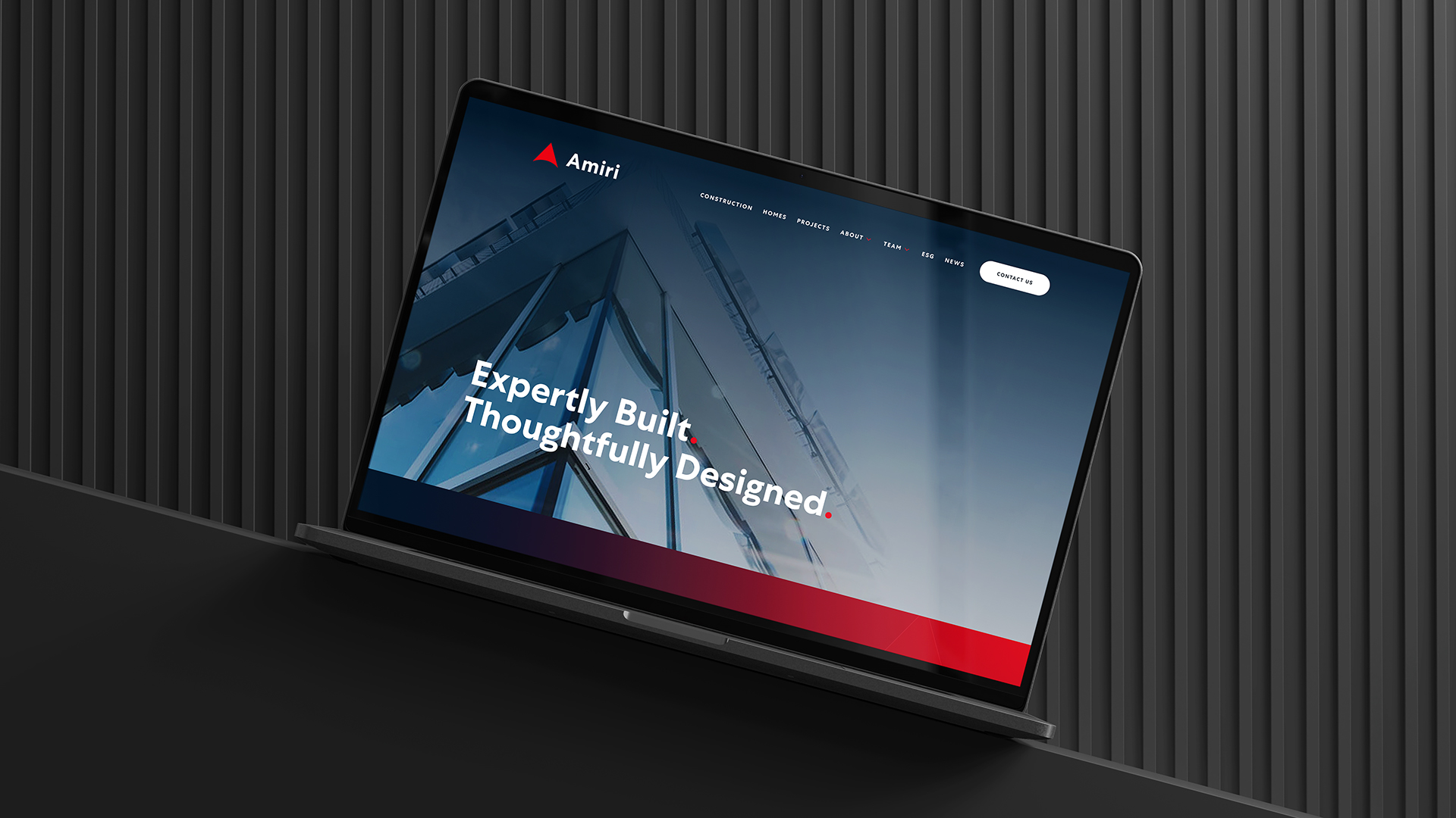 Laptop showing Amiri website