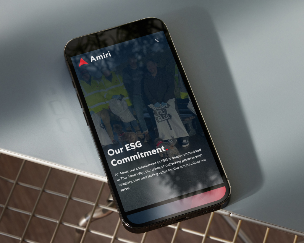 Mobile phone showing Amiri website