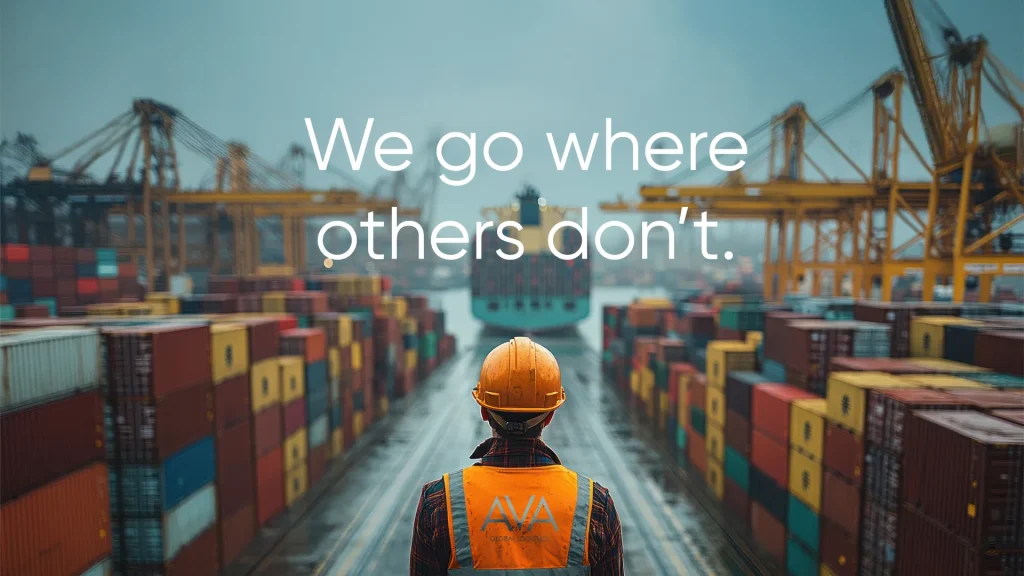 Ava ad with employee in dockyard filled with shipping containers wearing an ava logo high-vis with the words 'we go where others don't'