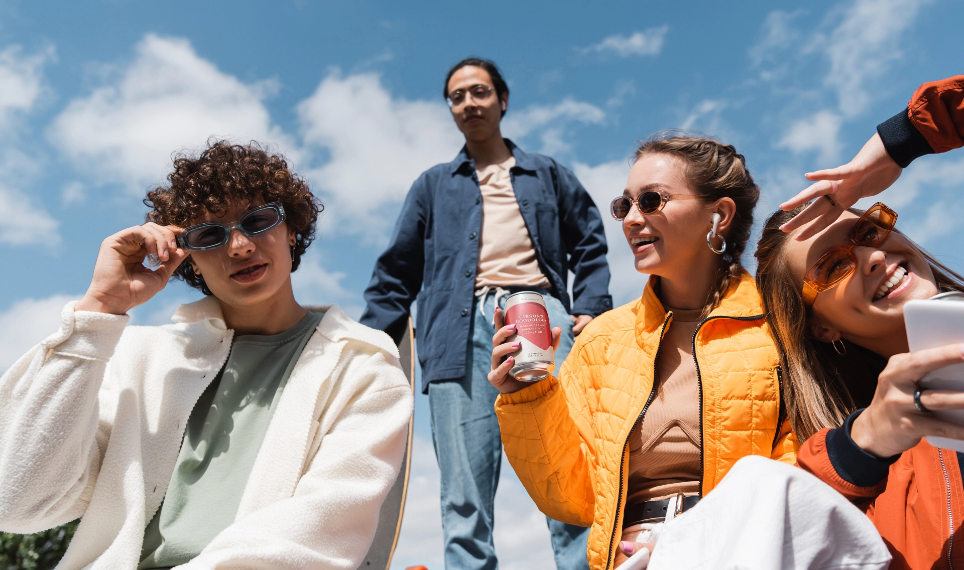 Young people drinking Gibsons Goodology drinks