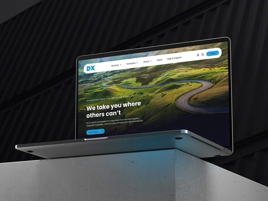 DX website on laptop